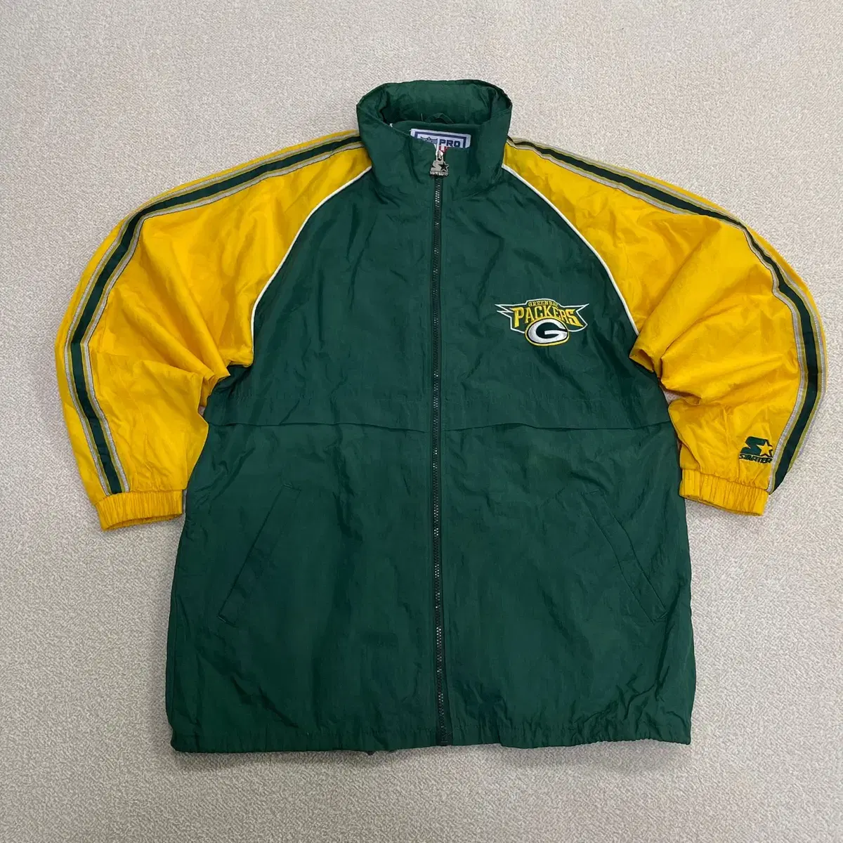 古着 90s LOGO7 NFLパッカーズグリーンベイ ナイロン ジャケット